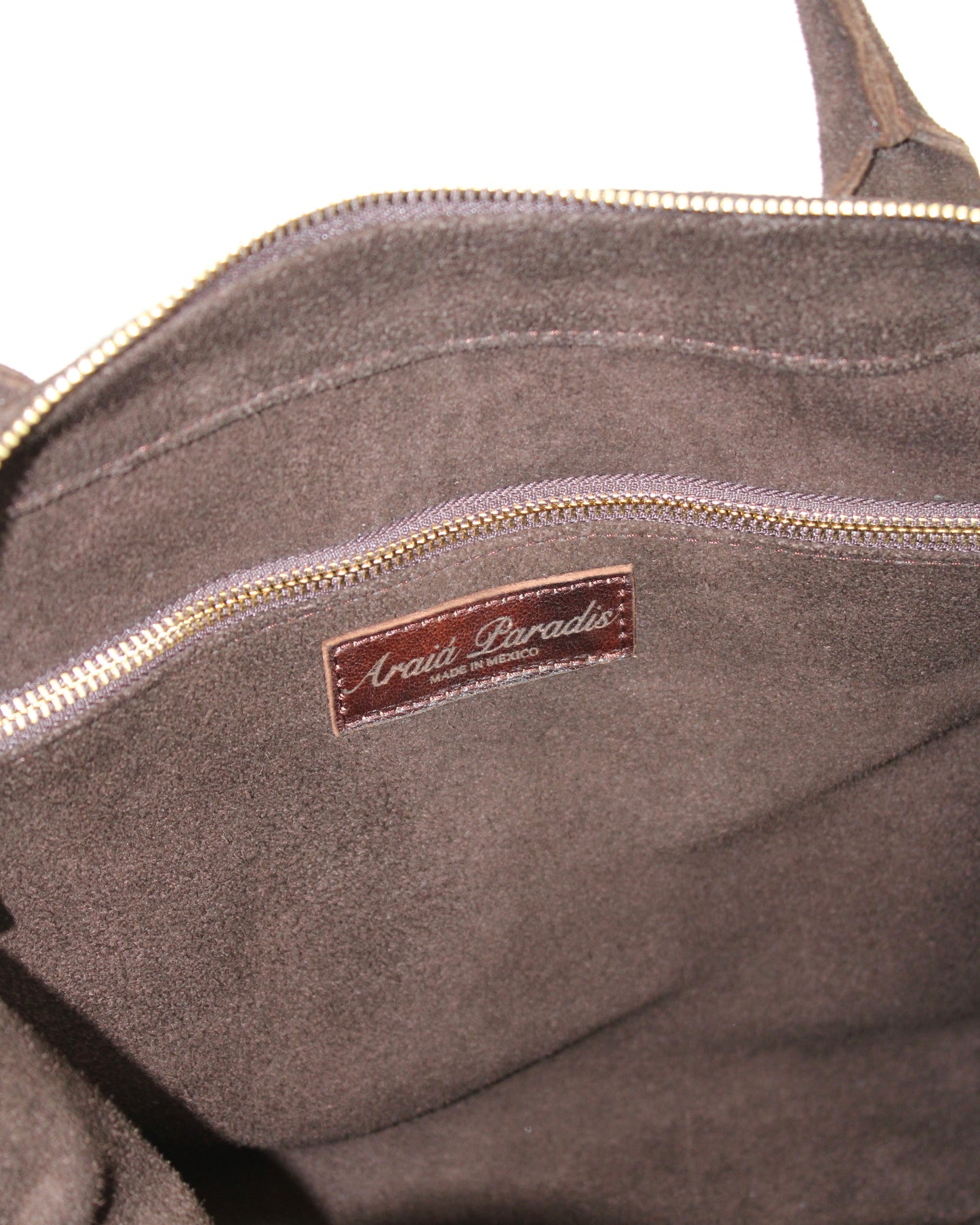The Nomad Bag in Marrón
